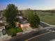 Beautiful aerial view of a home with a two-car garage and large yard in a desirable neighborhood at 6402 W 81St Ave, Arvada, CO 80003