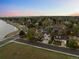 A birds eye view of the home and lake creates a suburban utopia at 6402 W 81St Ave, Arvada, CO 80003