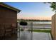 Deck with flower boxes and lake view at 6402 W 81St Ave, Arvada, CO 80003
