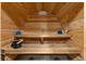 Inside the Sauna featuring wooden benches, bucket, and hats at 6402 W 81St Ave, Arvada, CO 80003