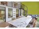 Bright and modern conference room with a spiral staircase, large table, and contemporary design elements at 1732 Wazee St # 201, Denver, CO 80202