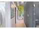 Spacious hallway with hardwood floors and custom railings leading to other areas of the home at 1732 Wazee St # 201, Denver, CO 80202