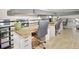 Office space with multiple desks, hardwood floors, and ample lighting, great for collaborative work at 1732 Wazee St # 201, Denver, CO 80202