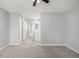 Spacious bedroom with a ceiling fan, carpet flooring, and ample natural light at 2927 W 81St Ave # B, Westminster, CO 80031