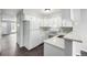 Bright kitchen features white cabinets, updated countertops, and stainless steel appliances at 2927 W 81St Ave # B, Westminster, CO 80031