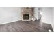 Inviting living room with a stone fireplace and modern flooring at 2927 W 81St Ave # B, Westminster, CO 80031