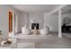 Finished basement featuring modern decor, a fireplace, and a walkout sliding door at 8249 Zephyr St, Arvada, CO 80005