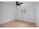 Bright bedroom with hardwood floors and a large window at 8249 Zephyr St, Arvada, CO 80005