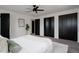 Well-appointed bedroom featuring spacious closets, neutral tones, and modern touches for a restful sanctuary at 8249 Zephyr St, Arvada, CO 80005