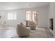 Inviting living room features modern finishes, natural light, and cozy seating, creating a relaxing atmosphere at 8249 Zephyr St, Arvada, CO 80005