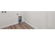Laundry room nook with washer/dryer hookups and wood look flooring at 9112 Telluride Ct, Commerce City, CO 80022