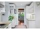 Contemporary kitchen with granite countertops and a view to the outdoors at 7900 Crest Dr, Lakewood, CO 80214