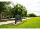 Scenic view of Denver's Greenway Park sign surrounded by lush greenery and blooming flowers at 7777 E 23Rd Ave # 1202, Denver, CO 80238
