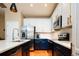 Stylish kitchen boasts stainless steel appliances, sleek countertops, and modern cabinetry at 7777 E 23Rd Ave # 1202, Denver, CO 80238