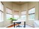 Bright office space with an abundance of natural light and a modern desk at 7777 E 23Rd Ave # 1202, Denver, CO 80238