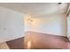 Spacious living room features hardwood floors and a ceiling fan at 10762 E Exposition Ave # 336, Aurora, CO 80012