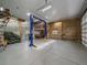Large garage featuring a vehicle lift, with an abundance of interior space at 7754 Swaps Trl, Evergreen, CO 80439