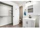 Clean bathroom with modern vanity, mirror, and closet for storage at 4871 S Dunkirk Way, Centennial, CO 80015