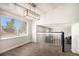 Dining area with modern lighting, bright walls, lots of natural light, and open floor plan at 4871 S Dunkirk Way, Centennial, CO 80015