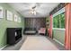Charming bedroom with floral wallpaper, neutral carpet, and a large window at 10450 Iris Way, Broomfield, CO 80021