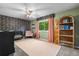 Cozy bedroom with floral wallpaper, neutral carpet, and ample natural light at 10450 Iris Way, Broomfield, CO 80021
