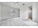 Spacious bedroom with carpet flooring and a ceiling fan at 8911 Eagle River St, Littleton, CO 80125