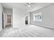 Bright bedroom featuring neutral walls and carpet flooring at 8911 Eagle River St, Littleton, CO 80125