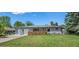 Charming home with well-maintained front yard, lovely landscaping, and attached two-car garage at 4855 E Atlantic Pl, Denver, CO 80222