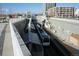 Modern train station with overhead walkways and tracks, providing easy transportation access at 4855 E Atlantic Pl, Denver, CO 80222