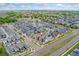 Neighborhood aerial view shows a well-maintained community with neat landscaping at 18552 E 54Th Ave, Denver, CO 80249