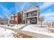 Charming two-story home with well-kept landscaping, offering curb appeal and a welcoming atmosphere at 18552 E 54Th Ave, Denver, CO 80249