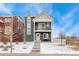 Charming two-story home boasts a balcony, well-manicured landscaping, and a welcoming entrance at 18552 E 54Th Ave, Denver, CO 80249
