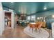 Spacious open-concept layout that combines kitchen and dining area, perfect for modern living at 18552 E 54Th Ave, Denver, CO 80249