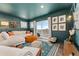 Inviting living room showcasing a comfortable sectional sofa and a sliding glass door leading to the outdoor balcony at 18552 E 54Th Ave, Denver, CO 80249
