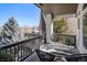Spacious covered deck with modern furniture and views of the surrounding landscape at 26781 E Clifton Dr, Aurora, CO 80016