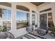 Comfortable covered balcony features neutral paint, modern decor, and views of the neighborhood at 26781 E Clifton Dr, Aurora, CO 80016
