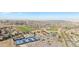 Aerial view of the community's clubhouse, pool, and tennis courts at 26781 E Clifton Dr, Aurora, CO 80016