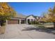 Beautiful home with a three-car garage, tidy landscaping and a charming entrance at 26781 E Clifton Dr, Aurora, CO 80016