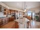 Spacious kitchen with granite counters, stainless steel appliances, and a breakfast nook at 26781 E Clifton Dr, Aurora, CO 80016