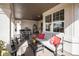 Comfortable covered patio with a seating area, perfect for relaxing outdoors at 26781 E Clifton Dr, Aurora, CO 80016