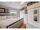 Inviting bedroom with ample closet space, natural light from the window, and wood accents at 1818 S Quebec Way # 4, Denver, CO 80231