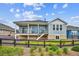 This home offers a backyard, a deck, and stone accents at 22183 E Rocky Top Pl, Aurora, CO 80016