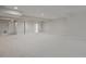 This finished basement offers a neutral palette, carpeting, and recessed lighting perfect for a variety of uses at 22183 E Rocky Top Pl, Aurora, CO 80016