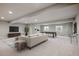 Finished basement with entertainment area, pool table and recessed lighting at 22183 E Rocky Top Pl, Aurora, CO 80016