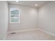 Minimalist bedroom with carpet and one window, ideal for creating a peaceful retreat at 22183 E Rocky Top Pl, Aurora, CO 80016