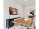Inviting dining room with sleek decor, adjacent to a modern kitchen with ample counter space at 22183 E Rocky Top Pl, Aurora, CO 80016