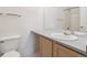 Bathroom with vanity and a toilet at 8371 S Upham Way # 103, Littleton, CO 80128