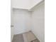 Walk-in closet featuring neutral carpet and shelf with hanging rod at 8371 S Upham Way # 103, Littleton, CO 80128