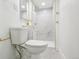 Basement bathroom with marble shower and gold fixtures at 720 Raleigh St, Denver, CO 80204