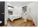 Charming bedroom with hardwood floors and plenty of natural light at 720 Raleigh St, Denver, CO 80204